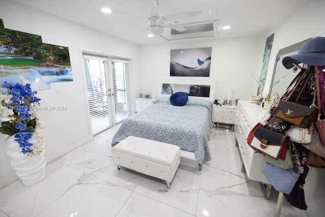 bedroom with ceiling fan and french doors