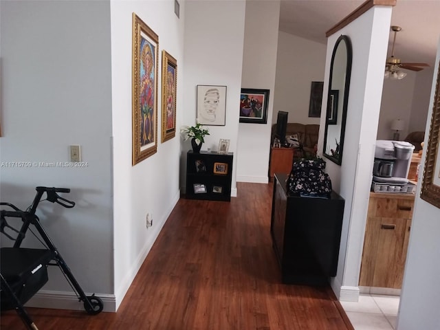 hallway with dark wood-type flooring