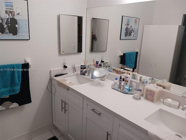 bathroom with vanity and tile patterned floors