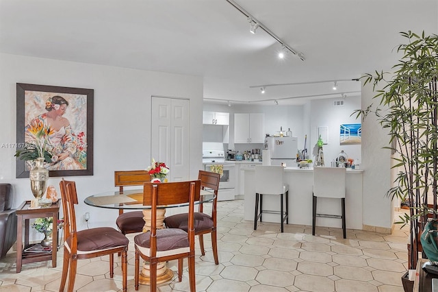 dining space with visible vents