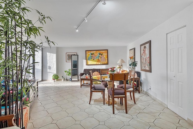 dining area with track lighting