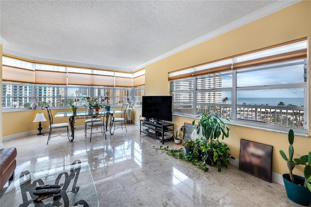 1985 S Ocean Dr Unit 6P, Hallandale Beach, FL 33009 - living area featuring ornamental molding, a textured ceiling, and baseboards