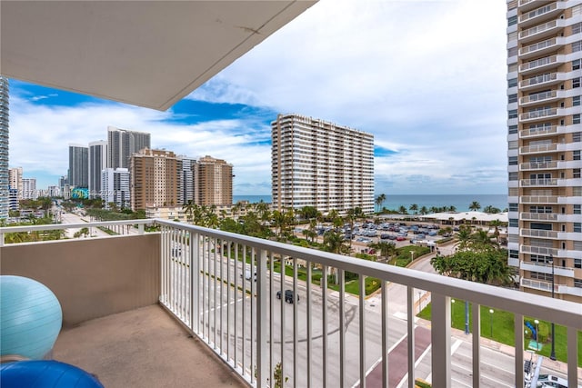 balcony featuring a water view