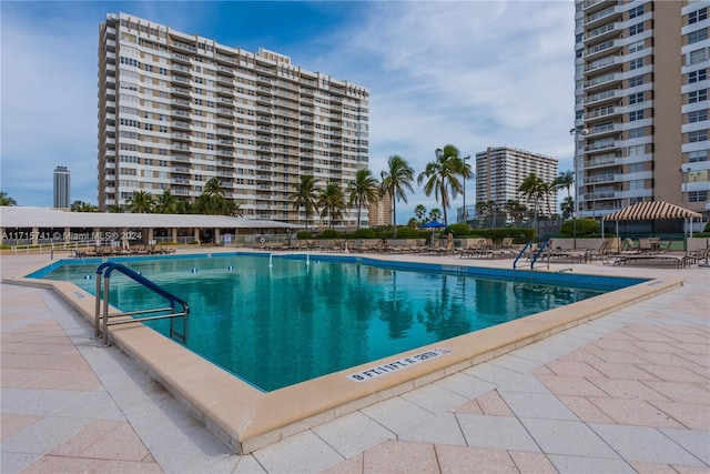 view of pool featuring a patio area