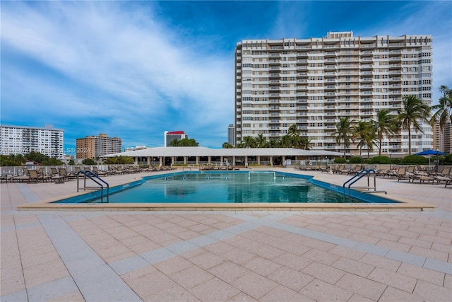 view of pool featuring a patio