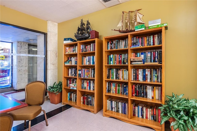 1985 S Ocean Dr Unit 6P, Hallandale Beach, FL 33009 - living area featuring wall of books