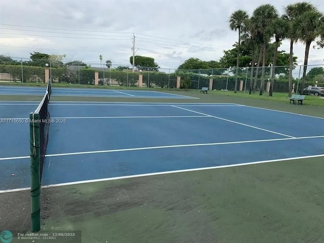 view of tennis court with basketball court