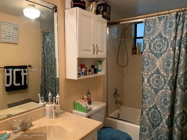 full bathroom featuring bathing tub / shower combination, vanity, and toilet