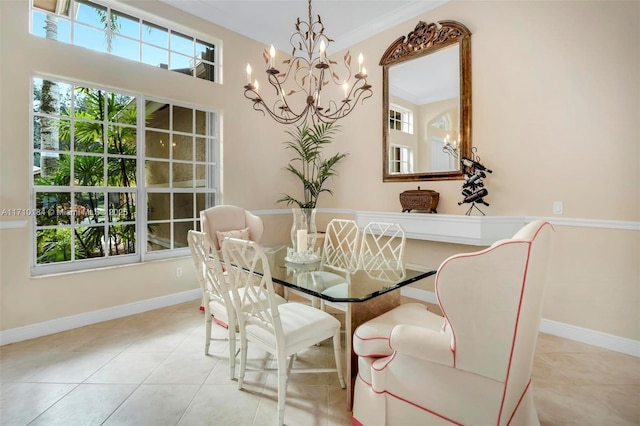 tiled dining area featuring a wealth of natural light, an inviting chandelier, and ornamental molding