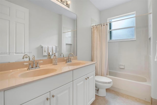 full bathroom featuring tile patterned flooring, vanity, toilet, and shower / bathtub combination with curtain