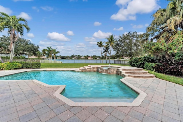 view of swimming pool featuring an in ground hot tub