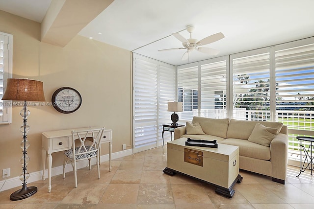 living room with ceiling fan