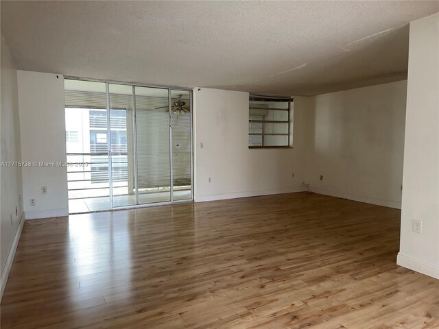 bedroom with carpet floors and a textured ceiling