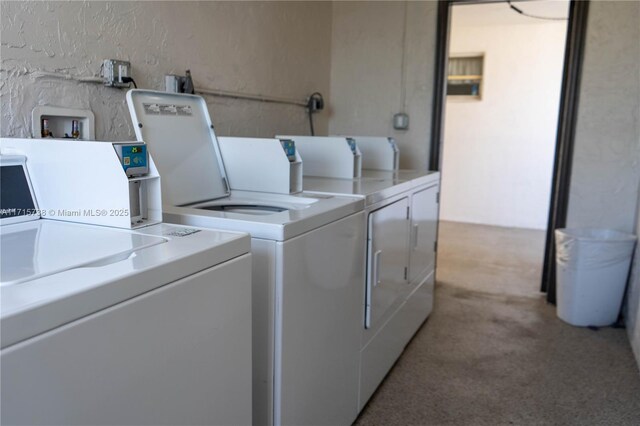 laundry room featuring washing machine and dryer