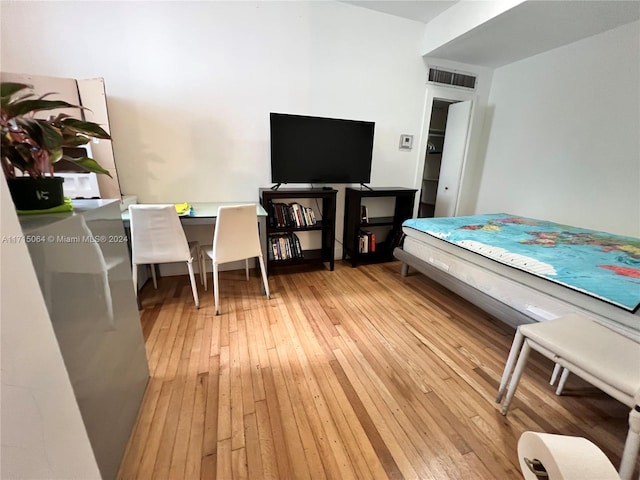 bedroom with light hardwood / wood-style floors