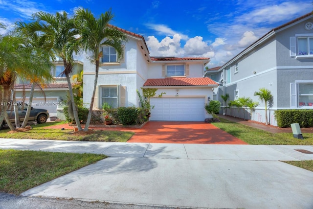 mediterranean / spanish-style house with a front yard, solar panels, and a garage