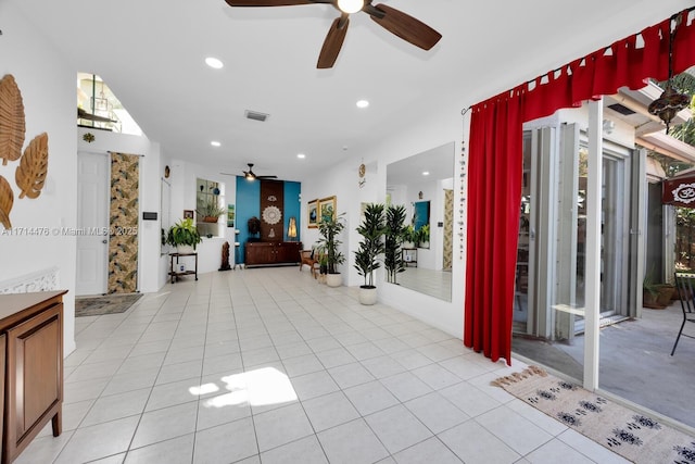 hallway featuring light tile patterned flooring