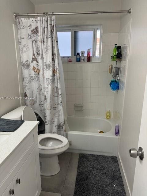 full bathroom featuring tile patterned flooring, vanity, shower / tub combo, and toilet