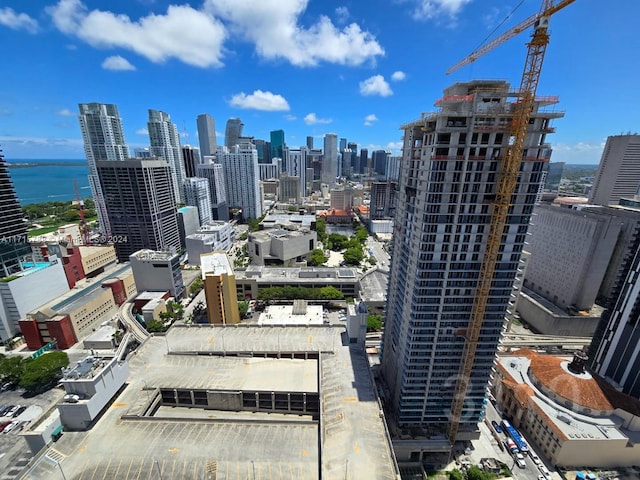 property's view of city featuring a water view