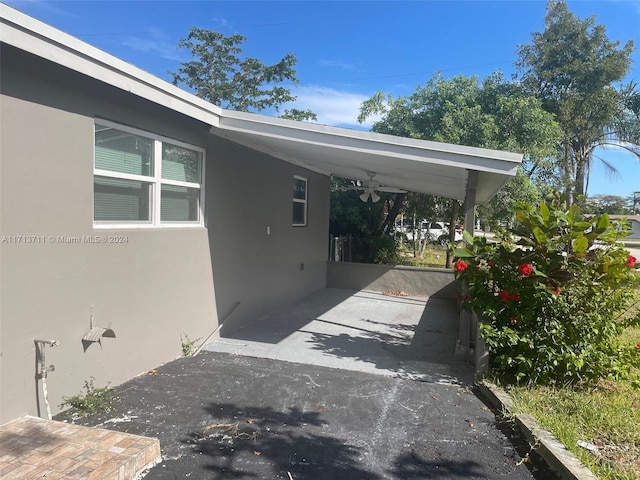 view of car parking featuring a carport