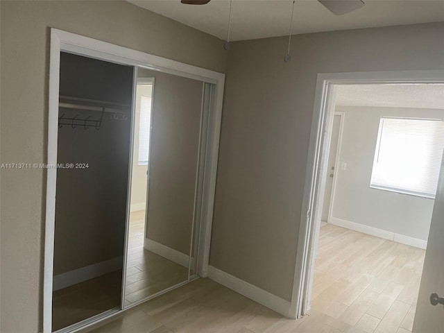 interior space featuring hardwood / wood-style floors and ceiling fan