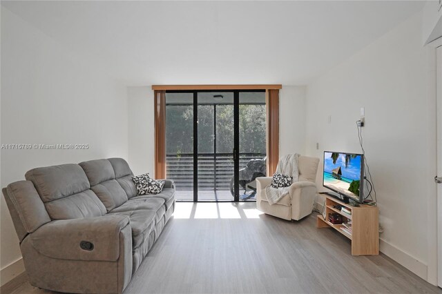 bedroom with dark hardwood / wood-style floors