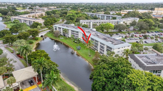 drone / aerial view with a water view