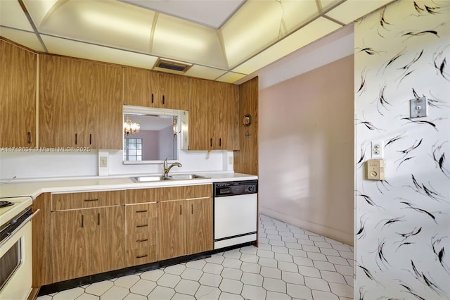 kitchen with white appliances and sink