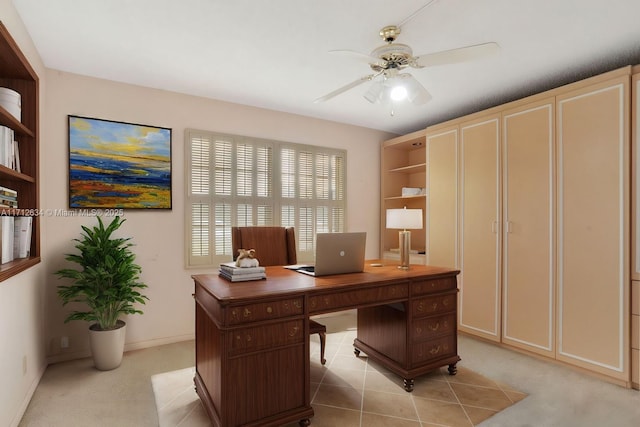 carpeted office with ceiling fan