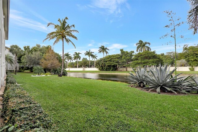 view of yard with a water view