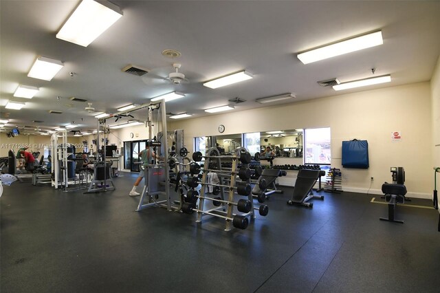 workout area with ceiling fan