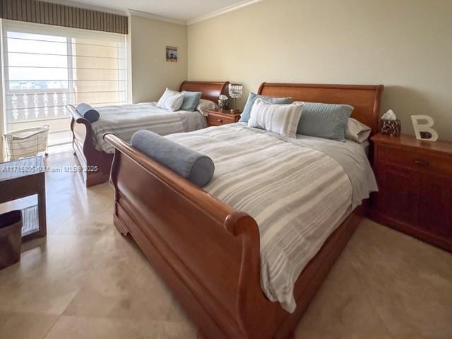 bedroom with ornamental molding