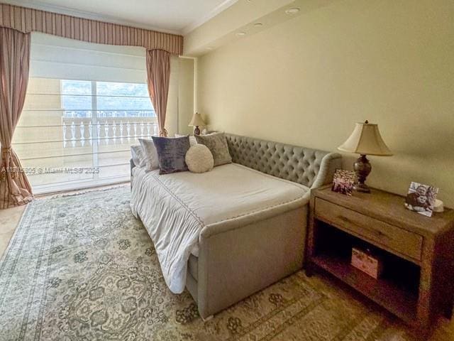 bedroom featuring crown molding