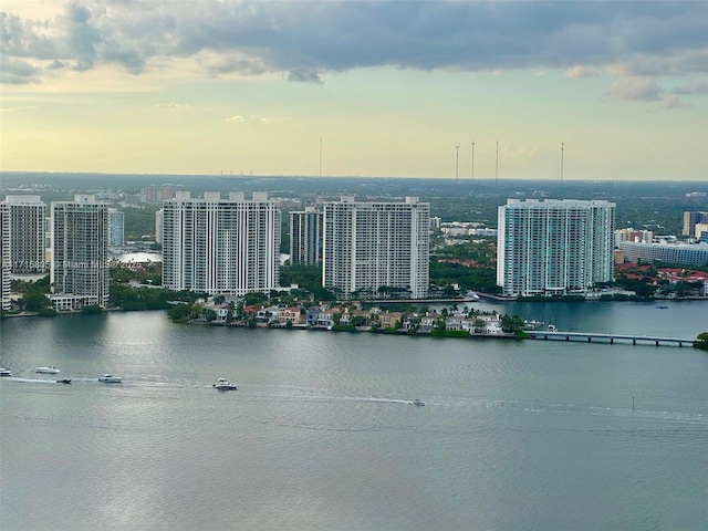 aerial view at dusk with a water view