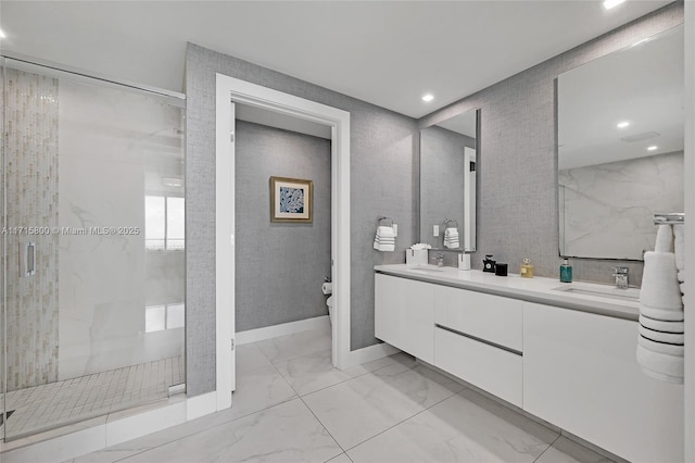 bathroom featuring vanity, an enclosed shower, and toilet