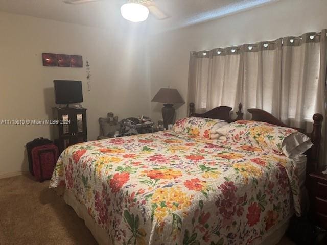 bedroom featuring carpet floors and ceiling fan