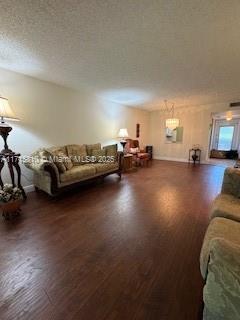 7500 NW 5th Pl Unit 103, Margate, FL 33063 - living area with wood finished floors