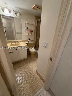 7500 NW 5th Pl Unit 103, Margate, FL 33063 - bathroom with vanity, a shower, and tile patterned flooring