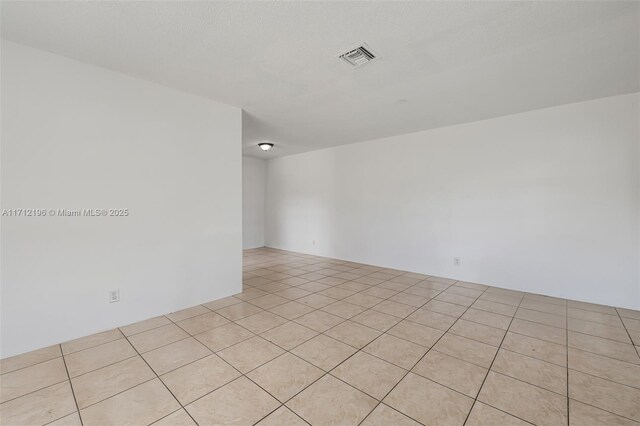 view of tiled empty room