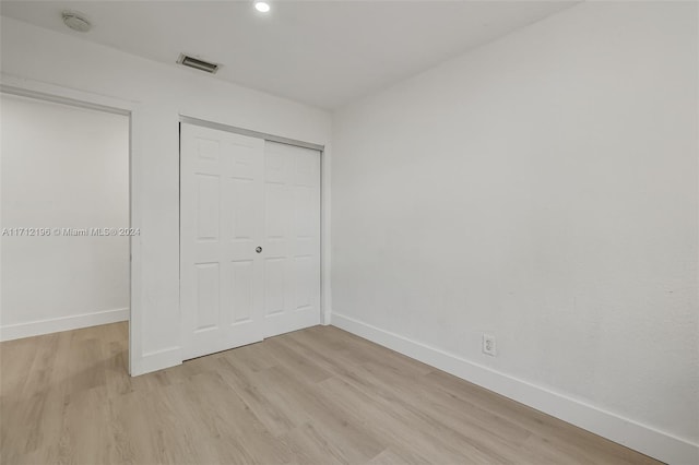 unfurnished bedroom featuring light hardwood / wood-style floors