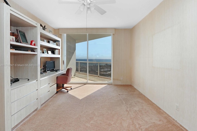 home office with carpet flooring and ceiling fan