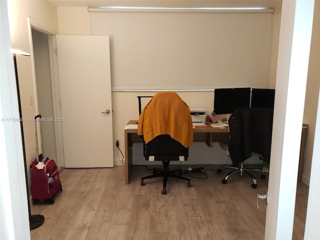 home office featuring light wood-type flooring