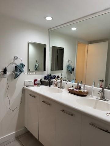 bathroom with vanity and tile patterned floors