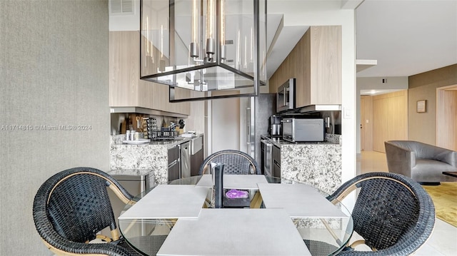 view of tiled dining room