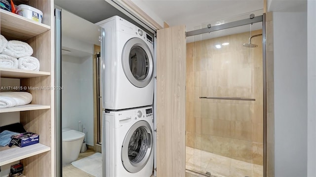 washroom with stacked washer / dryer