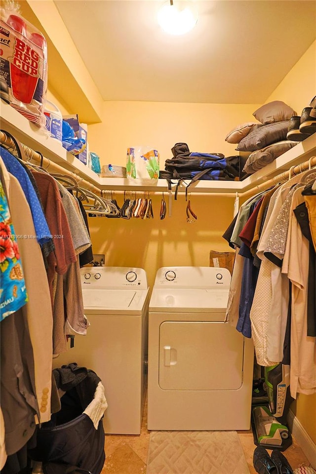 laundry room with separate washer and dryer