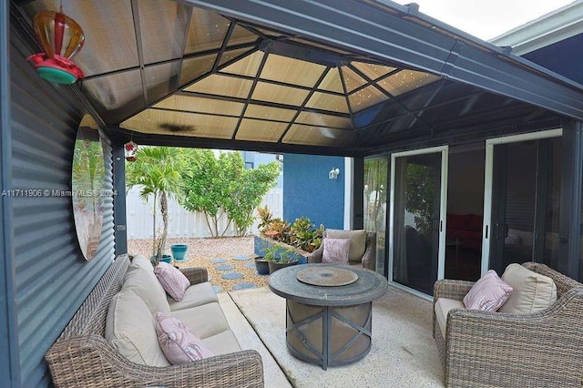 view of patio / terrace with a gazebo and an outdoor living space with a fire pit