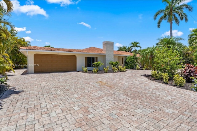 view of front of home with a garage