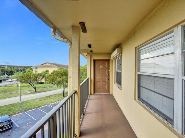 balcony with a wall mounted AC