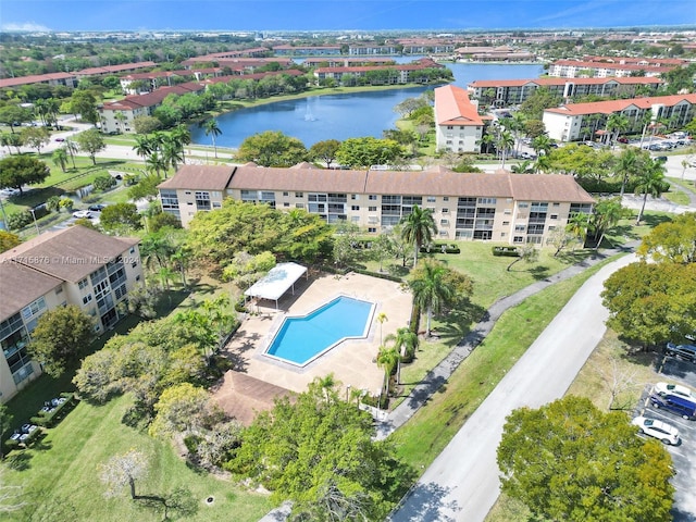 birds eye view of property featuring a water view